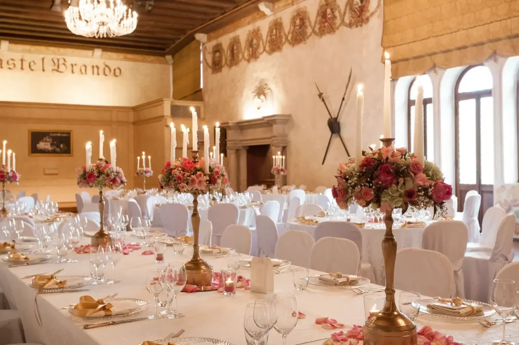 Elegant chapel decorated with white flowers for a destination wedding ceremony in Veneto, Italy