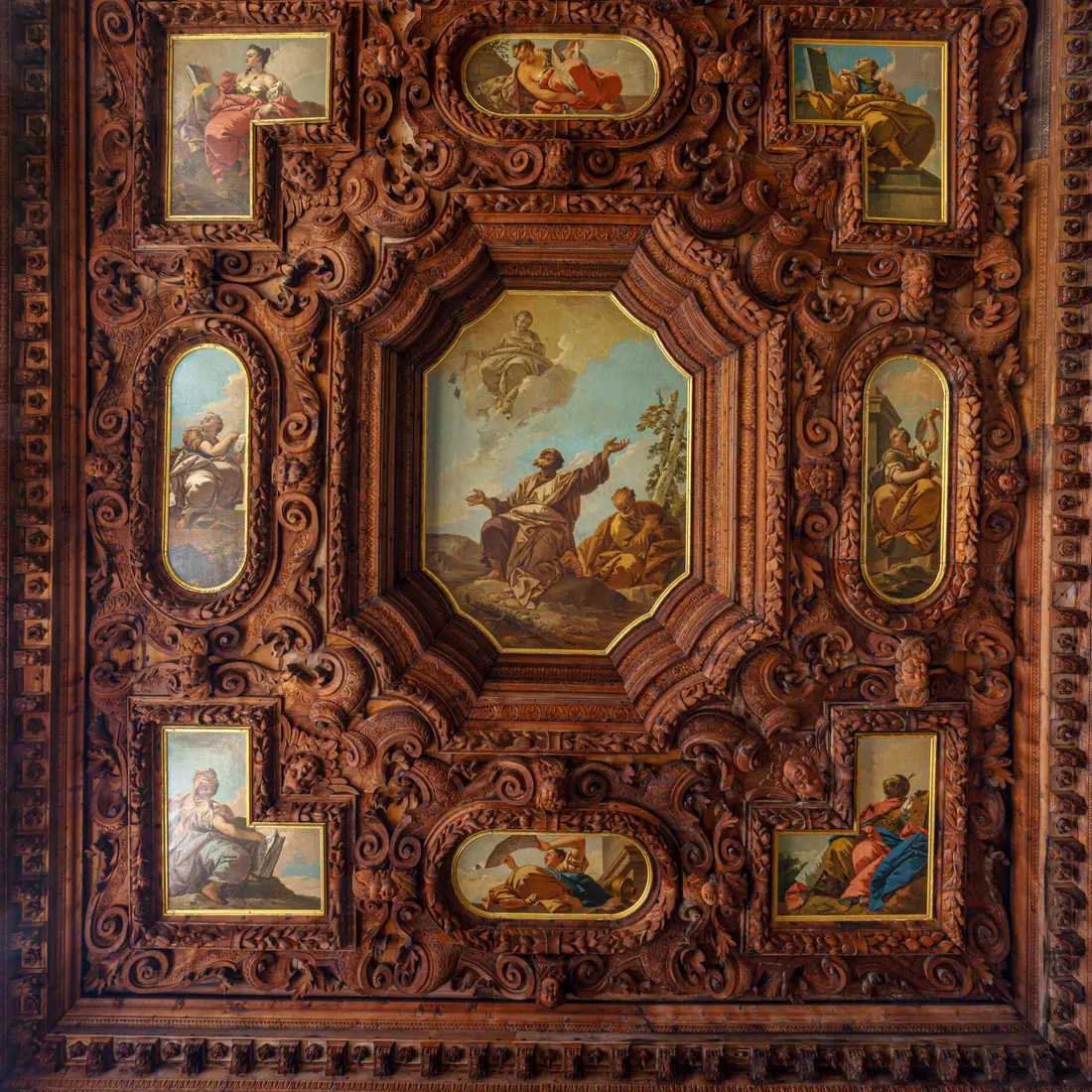 The carved and gilded wooden ceiling of the Archive Hall, with painted panels