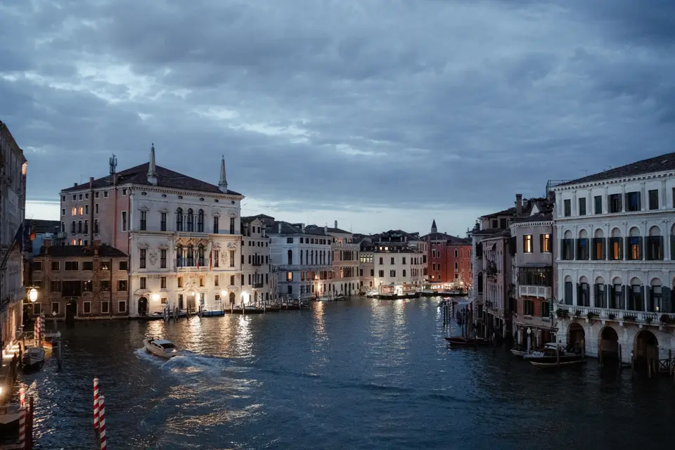 The Grand Canal at dusk, with the lights of the palaces reflected on the water